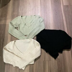 three long sleeve cropped tops